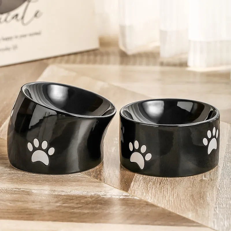 Ceramic cat bowl with high-footed design showing cat's paw decoration pattern in selected colour