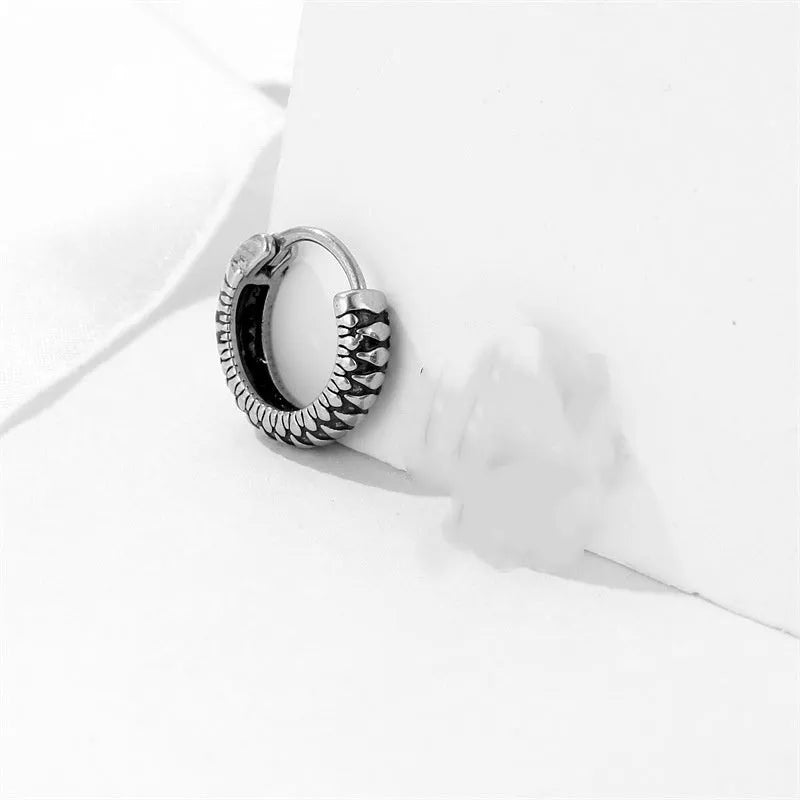 Silver geometric alloy earrings with retro twist design and striped sports-style elements