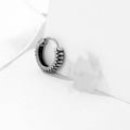 Silver geometric alloy earrings with retro twist design and striped sports-style elements