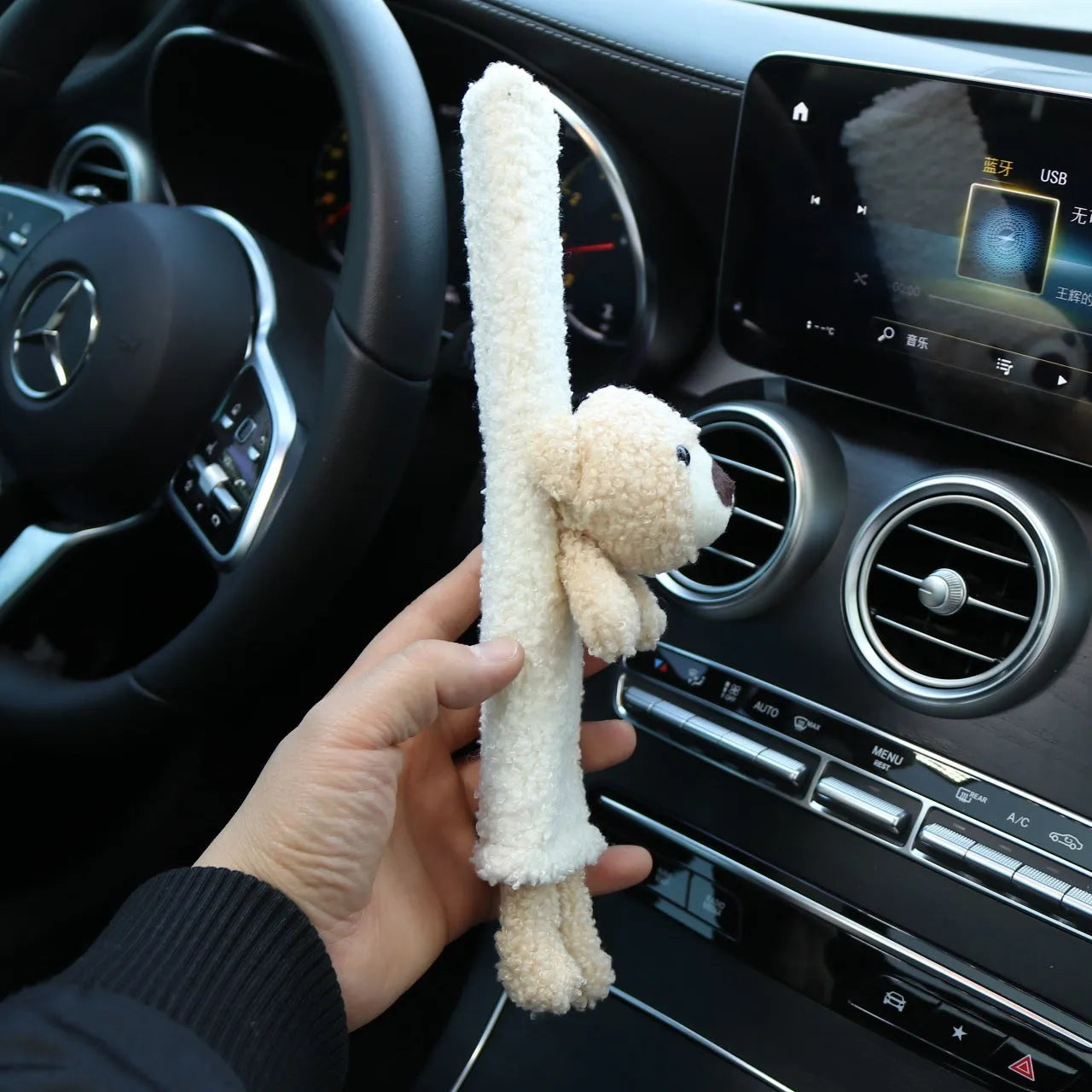 Cartoon plush car seat belt shoulder protector in lamb wool, showing rabbit and bear designs.