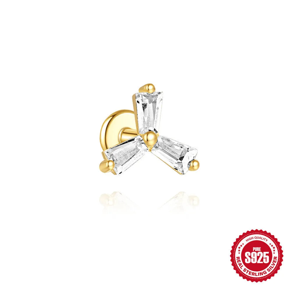 Golden geometric sterling silver earrings with zircon stones for double piercings, showing chain and stud designs