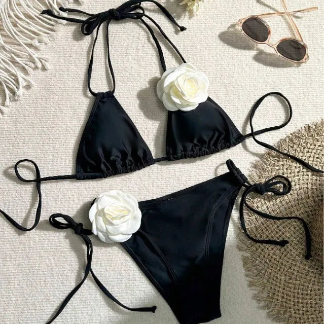 Black women's two-piece bikini with 3D floral lace detail on drawstring waistband, backless design.