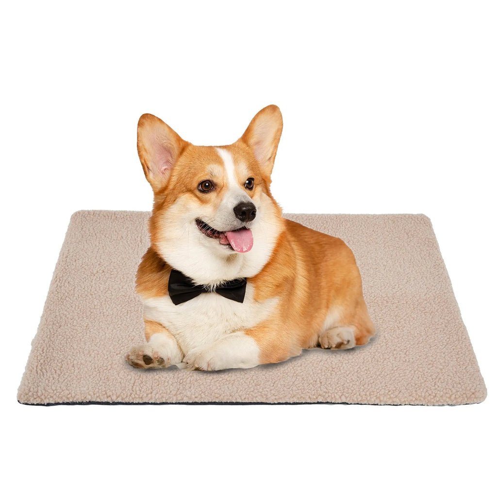 Grey self-heating plush pet pad for cats and dogs on a wooden floor