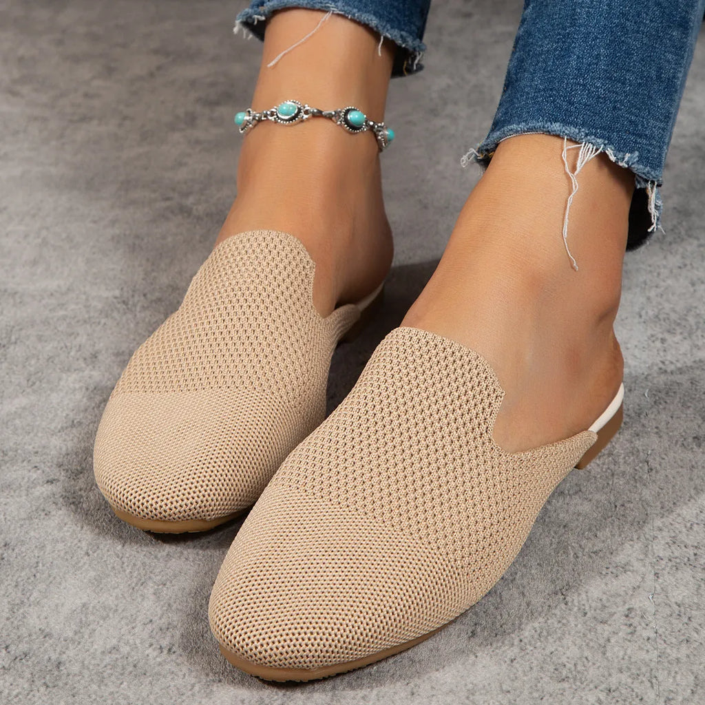 Apricot, blue, and green mesh slip-on sandals with a round toe and flat rubber sole.