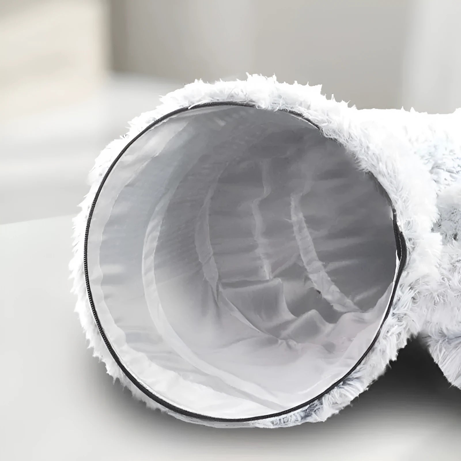 Plush collapsible cat bed with tunnel, non-slip base, and removable washable cushion for indoor pets