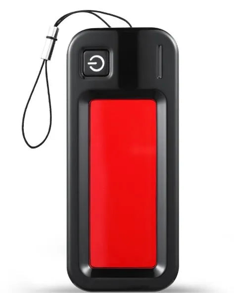 Small red reverse camera detector unit with a scanner window for detecting hidden surveillance lenses.