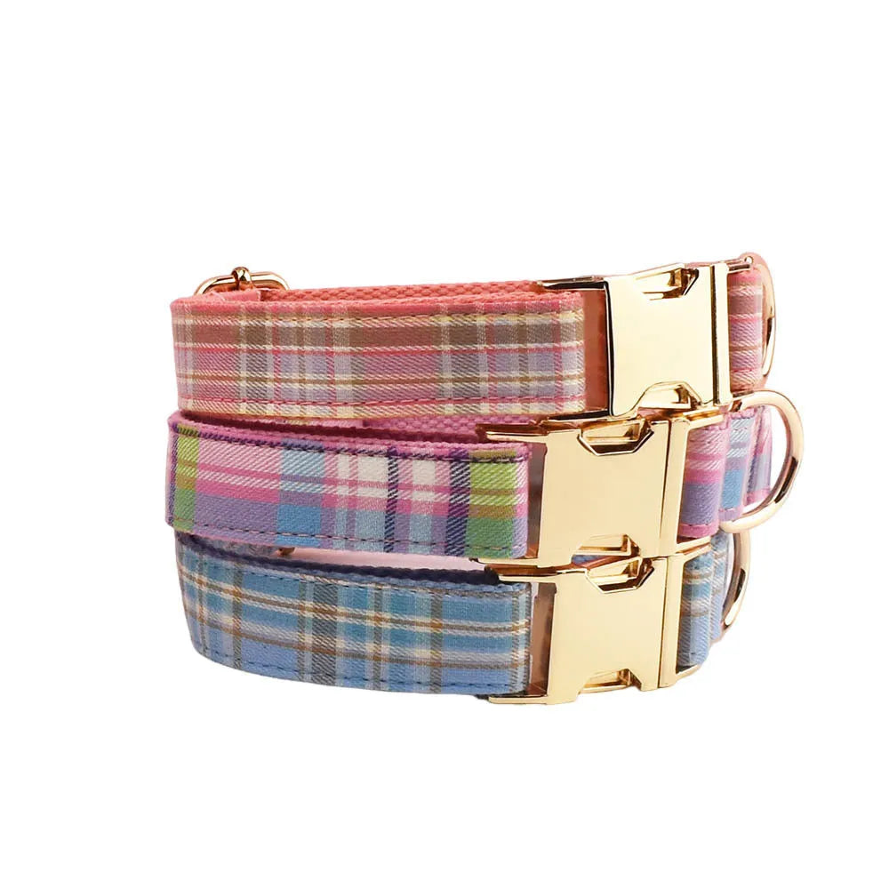 Qicaigei four-piece cloth dog collar, leash, vest, and bow set laid flat, showing assorted colour options.