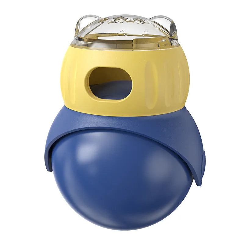 Yellow and blue owl-shaped plastic tumbler cat puzzle feeder toy on a plain background.