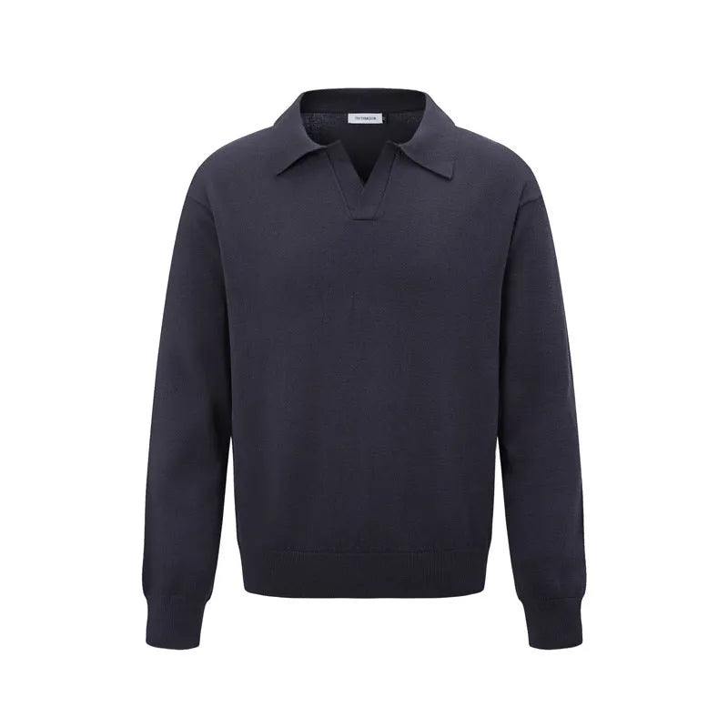 Loose black pullover sweater on a hanger, showing casual fit
