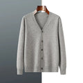 Man wearing a beige V-neck Andy velvet cardigan coat with long sleeves