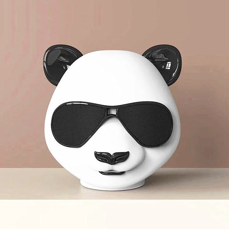 Portable mini Bluetooth speaker with classic style design showing wireless connectivity and USB charging port