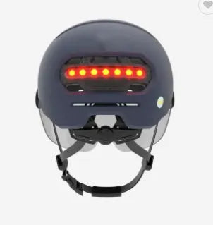 Cycling helmet with integrated automatic LED brake light on rear, shown in available style options
