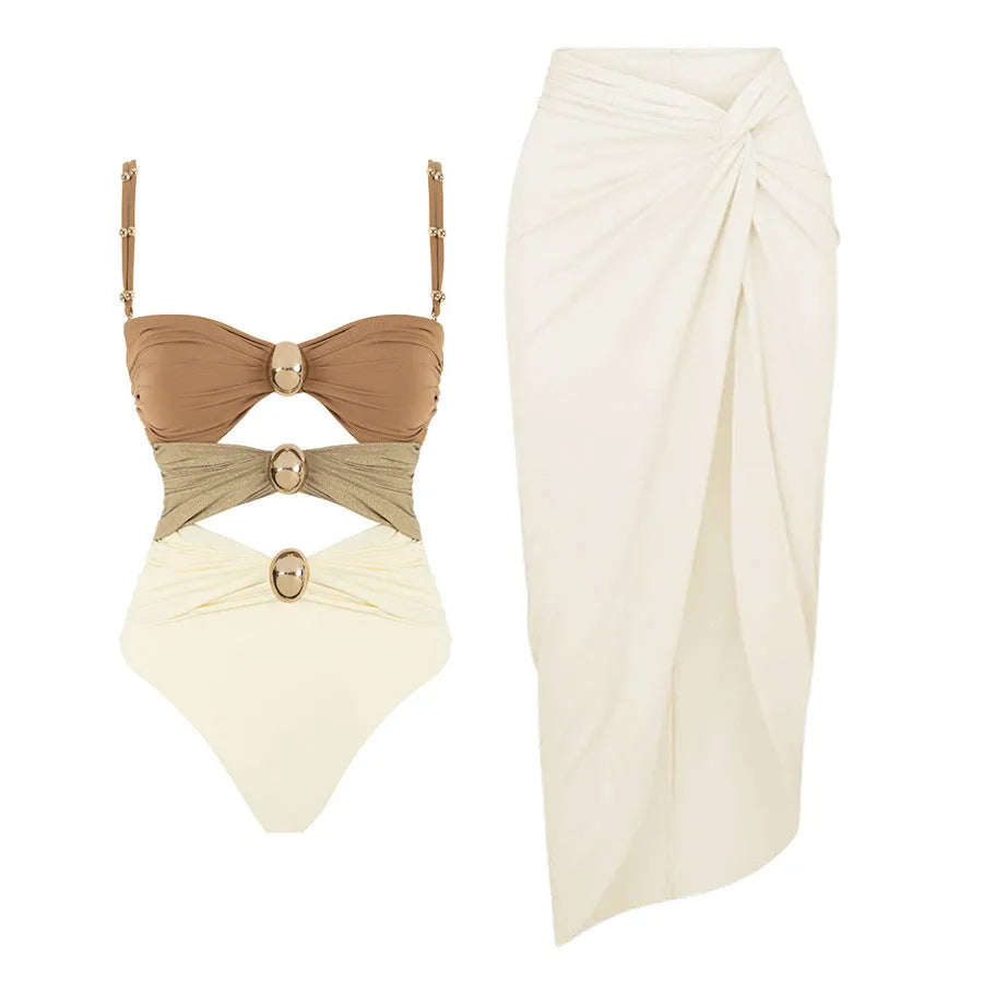 Women's solid colour one-piece swimsuit with gold button and matching skirt in black, blue, brown or pink