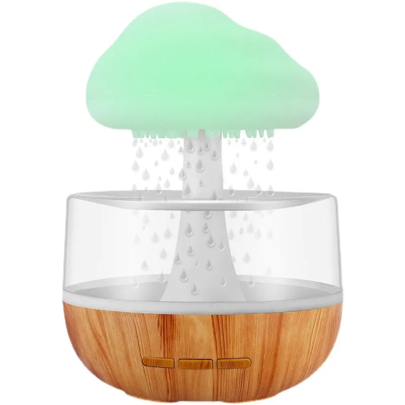 White cloud-shaped humidifier with colour-changing night light and USB cable.