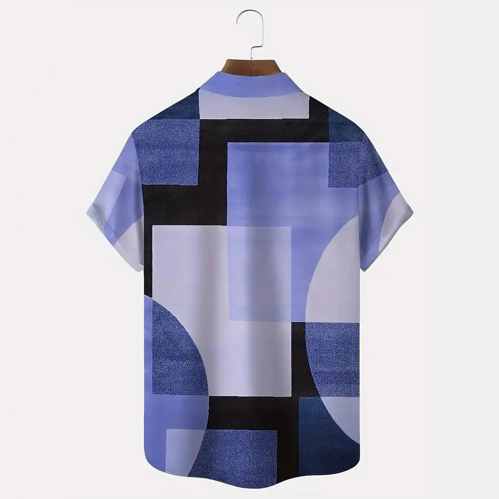Man wearing a loose-fit short sleeve cardigan with a striped retro geometric pattern in contrasting colours.