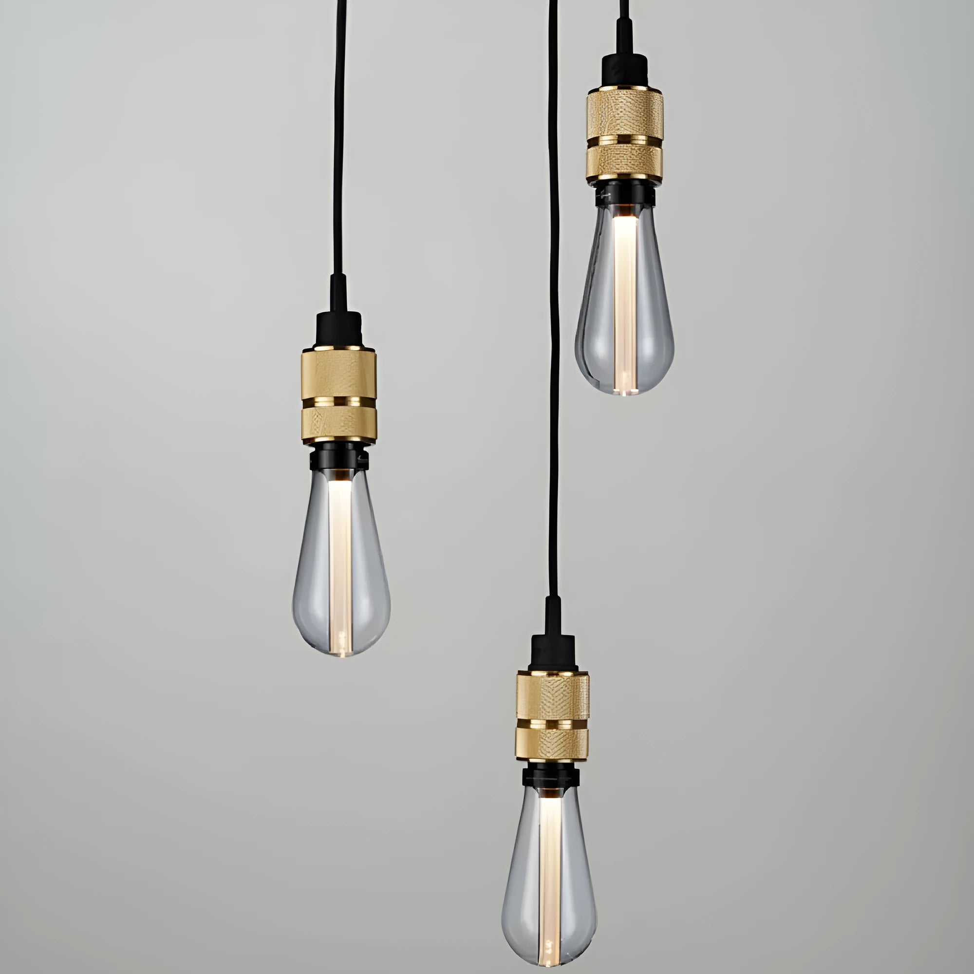 DIY retro chandelier ceiling light kit components in shiny black, rose gold, gold, and chrome finishes