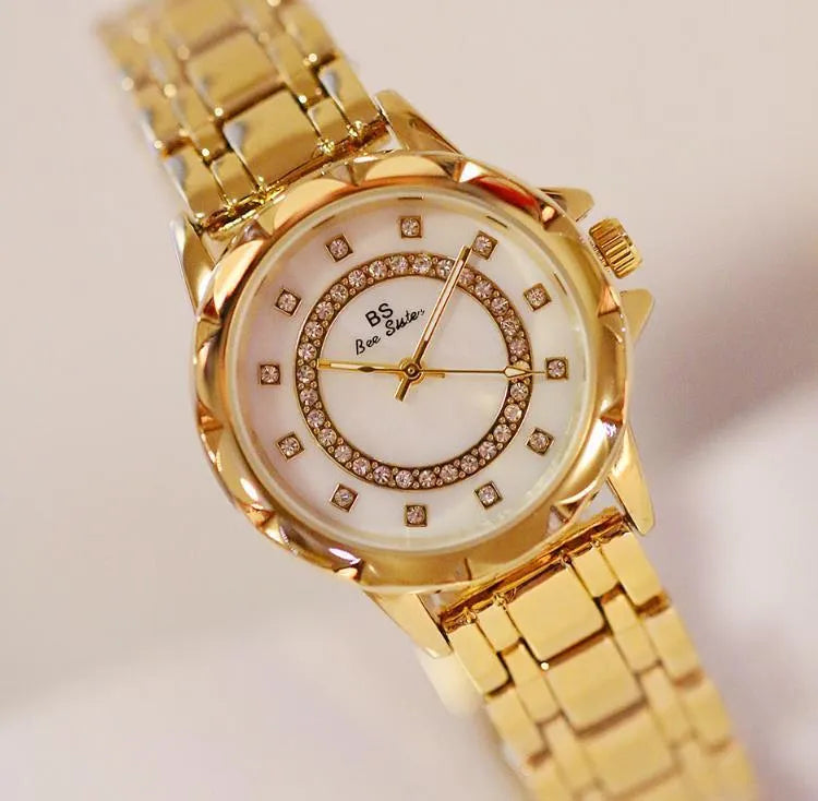 BS New Diamond Women's Watch with genuine diamond accents on a gold finish dial showing 3.2mm diameter