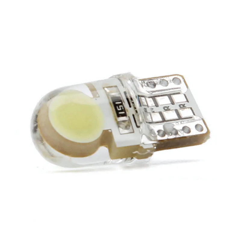 Pack of ten T10 wedge base LED bulbs for 12V car lighting in various colours on a white background.