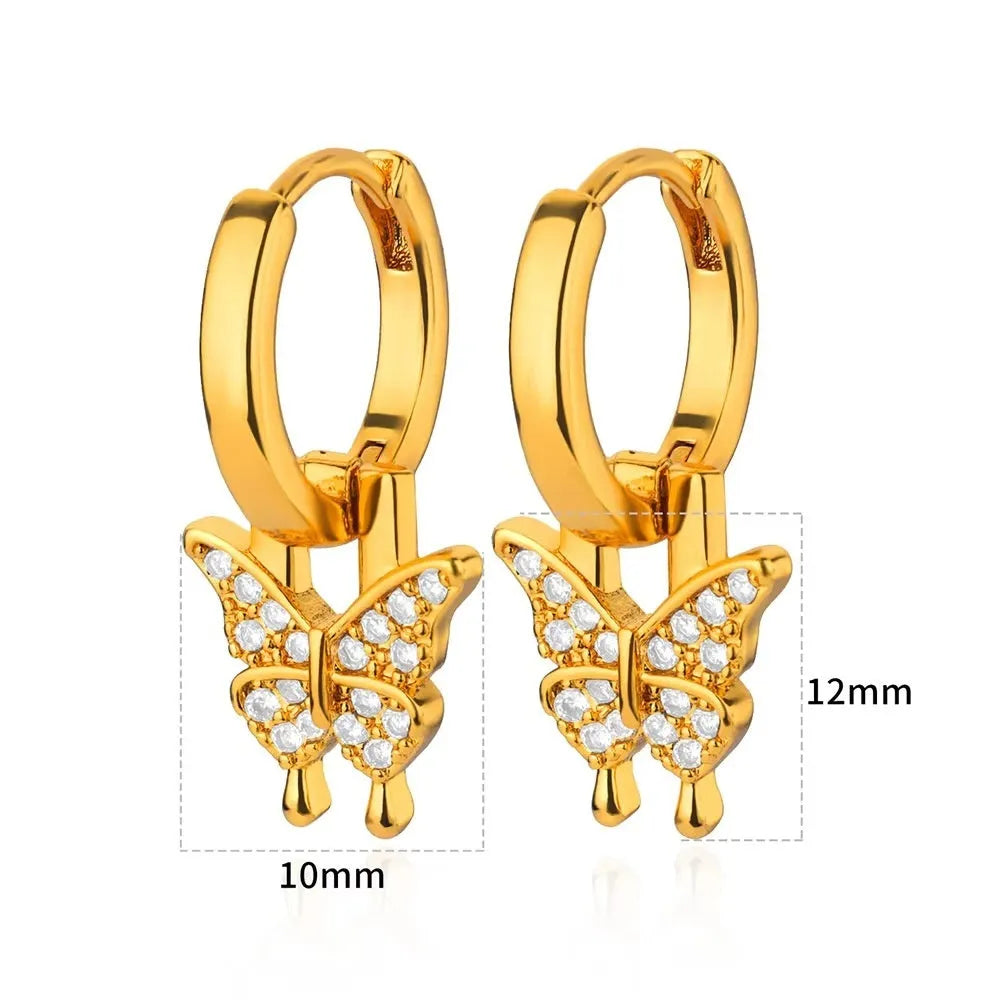 Women's copper geometric butterfly earrings with heart and star motifs in various colours.