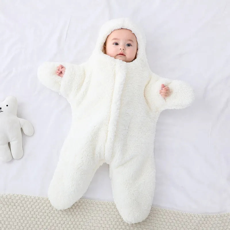 Cashmere and cotton baby sleeping bag with hood, shown in pink, grey, light blue, or khaki.