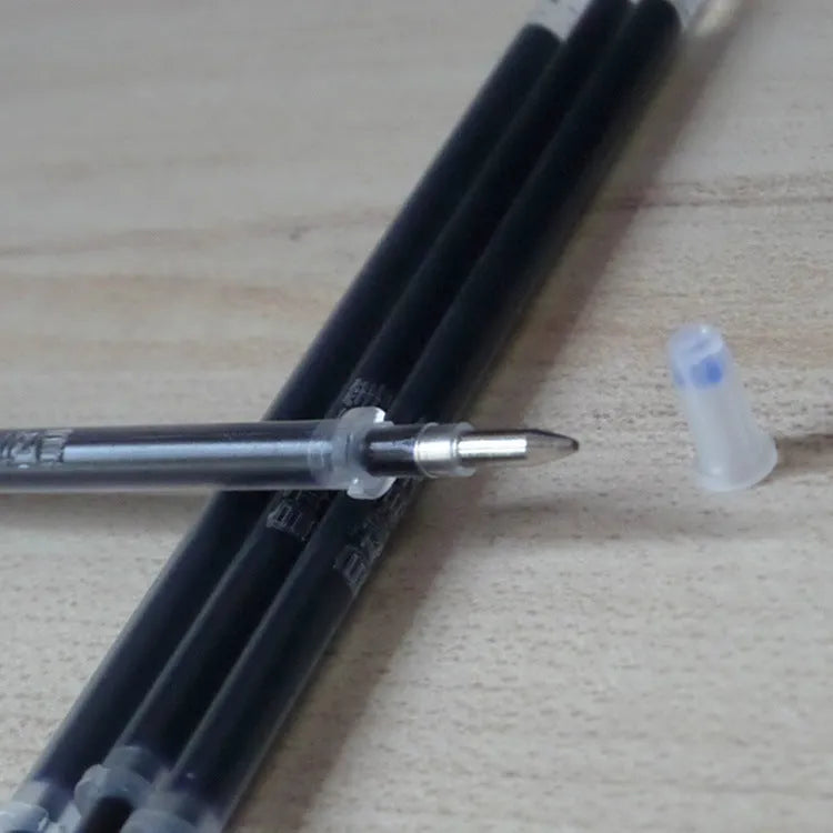 Automatic fade and disappear pen set with pen holder, storage case, and eight refill cartridges for temporary fabric markings