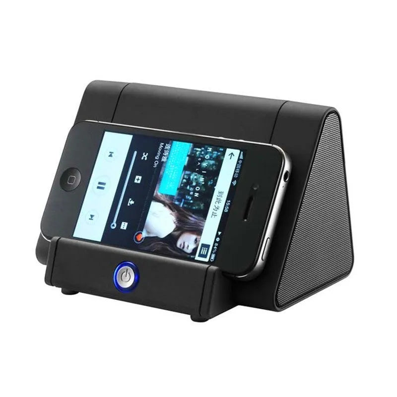 Black and white wireless mini Bluetooth speaker with built-in charging cable