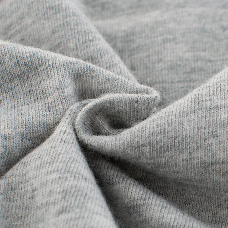 Grey children's cotton T-shirt shown with a size chart listing measurements from 90cm to 140cm.
