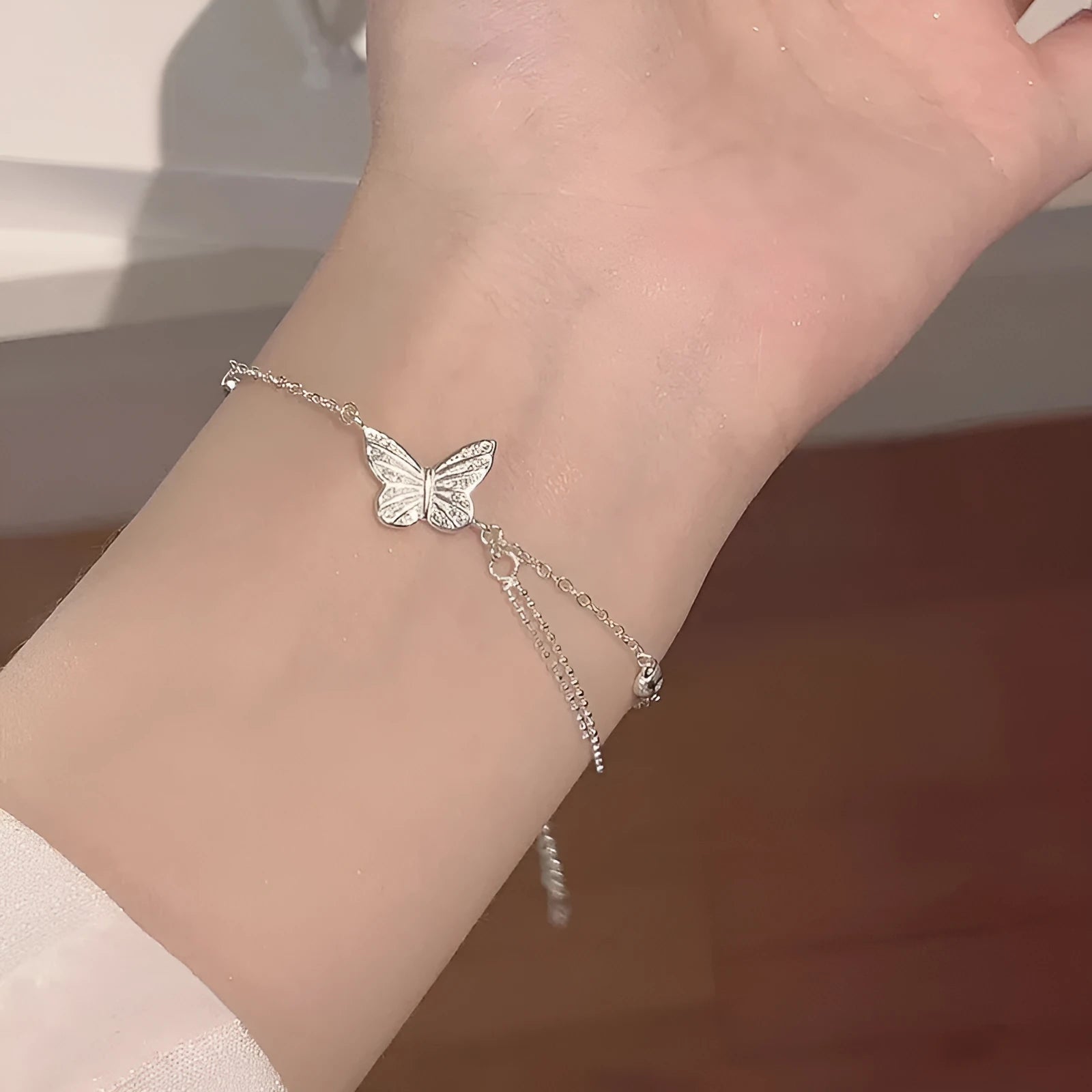 Fashion sweet butterfly bracelet for women, copper plated white gold with electroplated finish