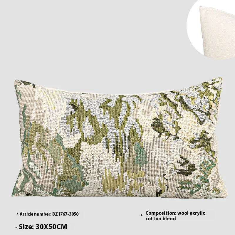 Antique green wool blend cushion with abstract spring flower botanical pattern.