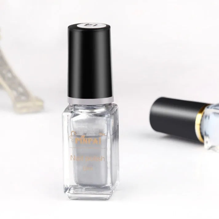 6ml bottle of mirror silver chrome nail polish with metallic reflective finish