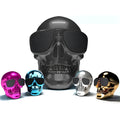 Skull-shaped portable Bluetooth speaker with 10-hour battery in multiple colour options
