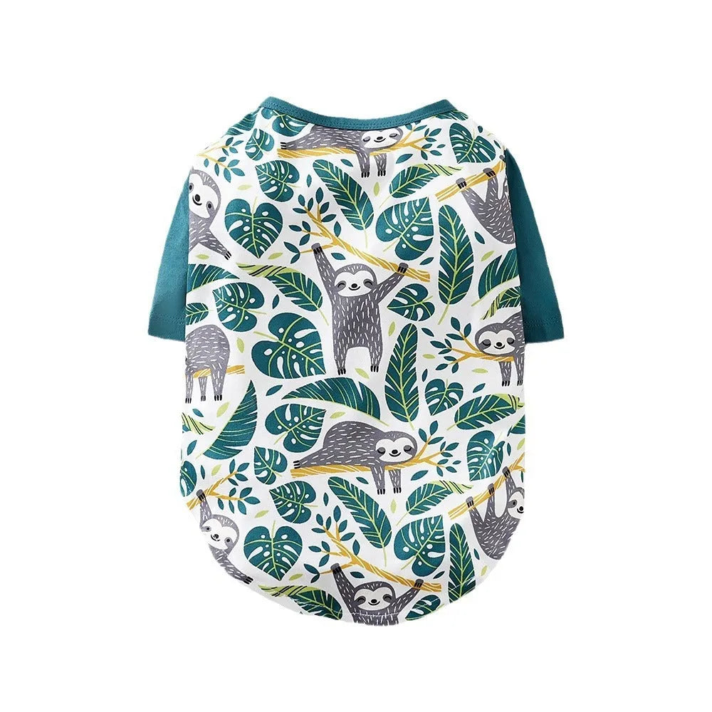 Colourful printed polyester t-shirt on a small dog, showing the casual fit and design.