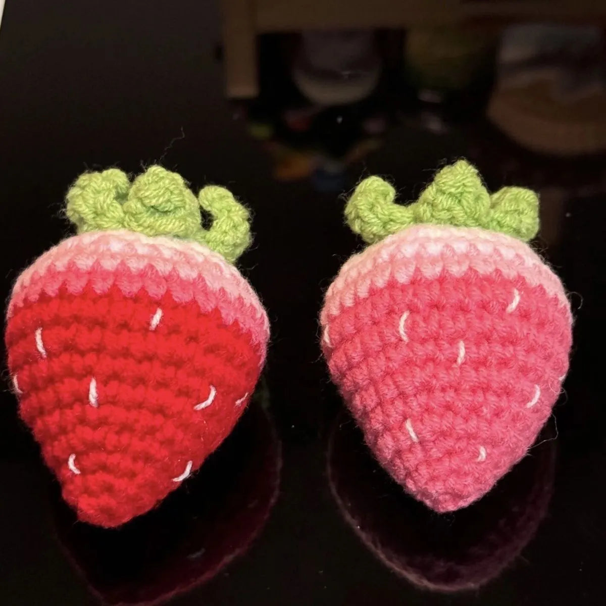 Soft plush strawberry pendant keychain in pink and red colour options with metal ring