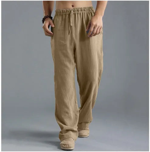 Men's linen loose casual sports pants in khaki, side view, on a hanger
