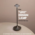 Modern metallic UFO-shaped rechargeable table lamp with touch dimming in black finish.
