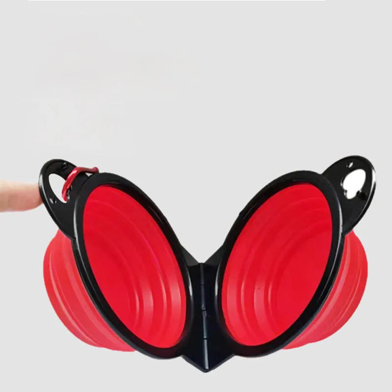 Blue silicone folding double pet bowl showing food and water compartments, folded flat beside it.