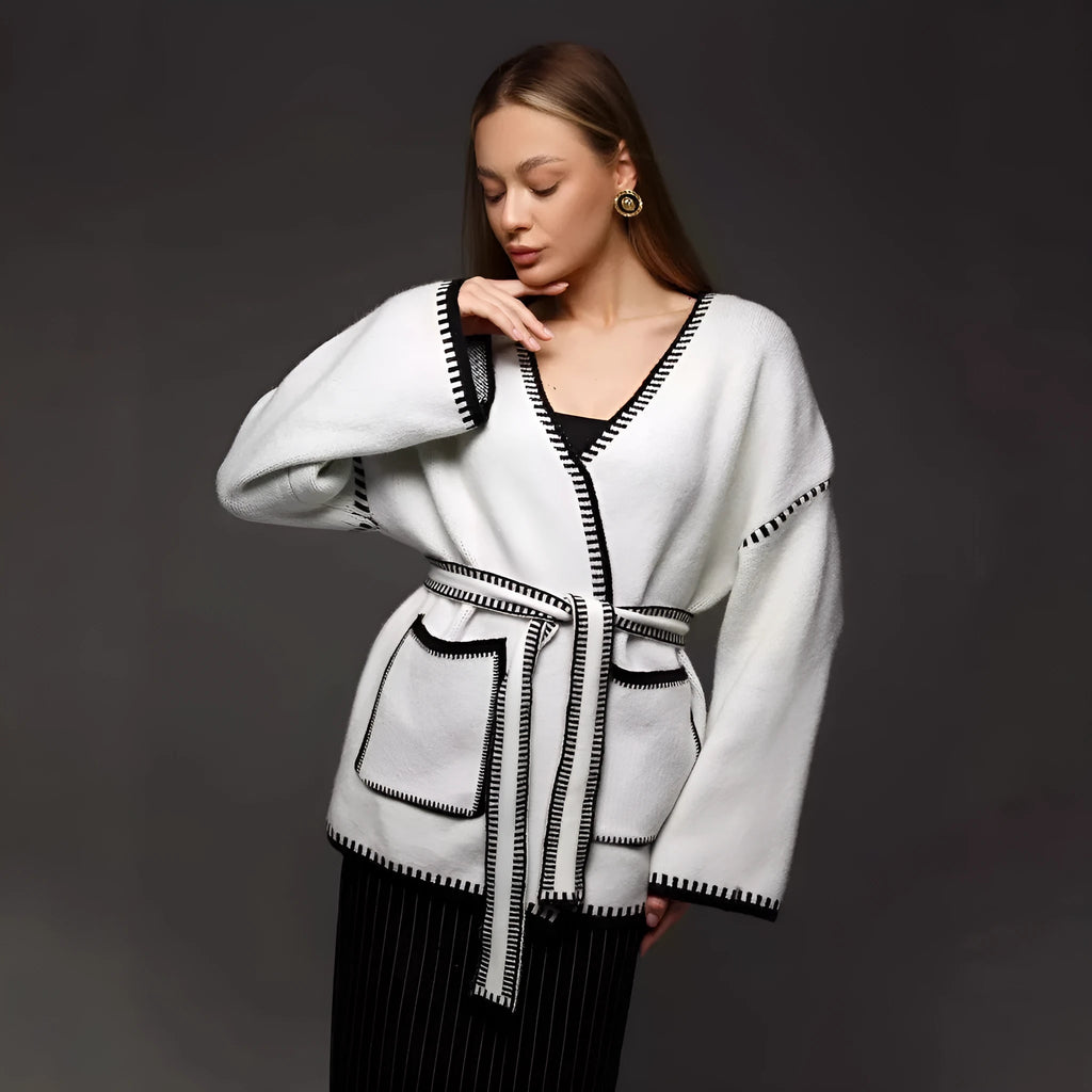 Loose fit lace-up front knitted cardigan in black, camel, or white colours.