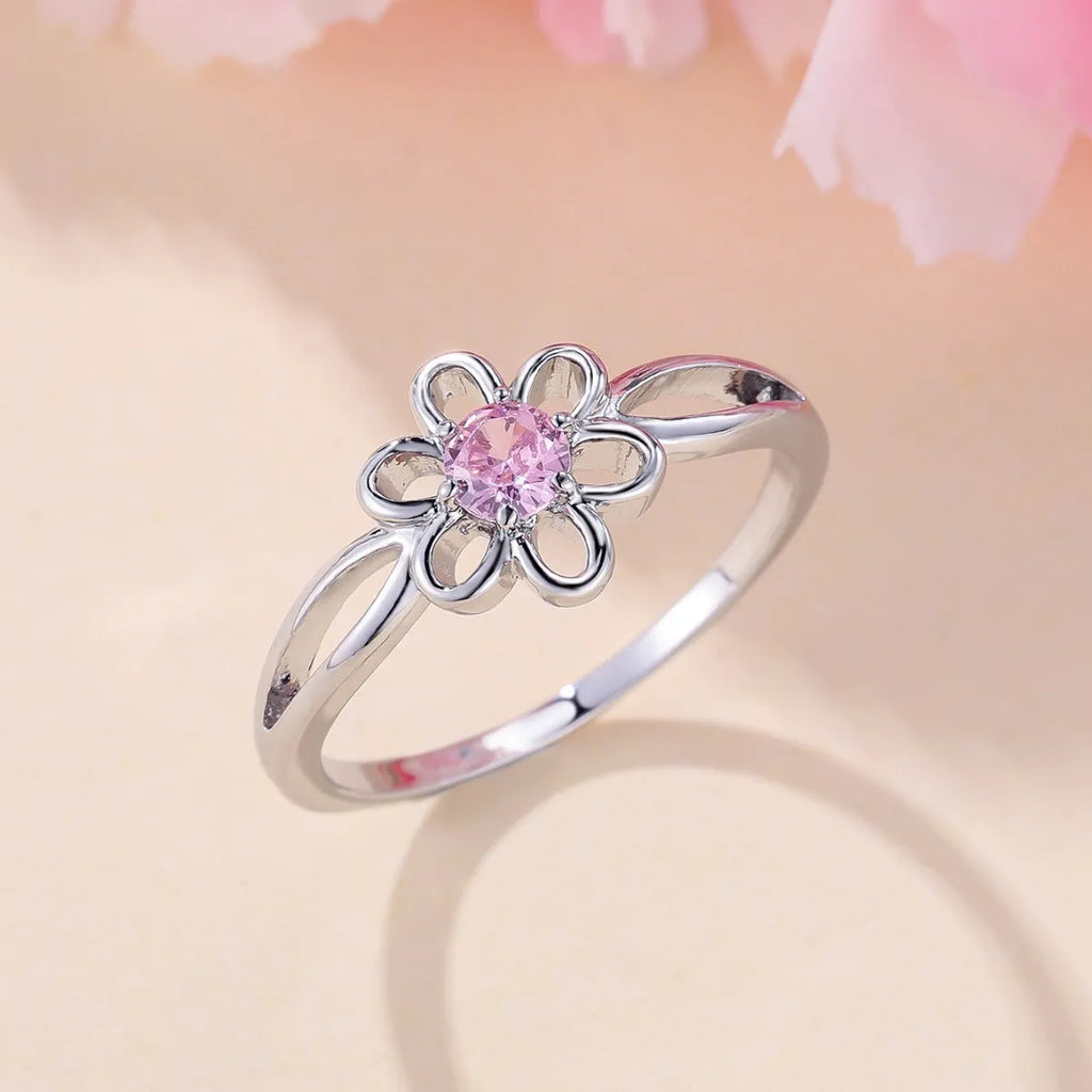Women's hollow flower fashion ring in electroplated copper with floral design