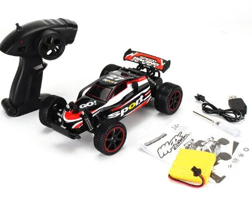 Blue 1:18 scale remote control drift car with 2.4GHz transmitter on black surface