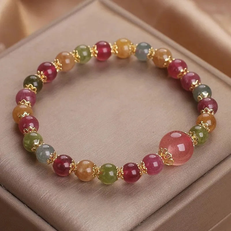 Handmade tourmaline strawberry quartz bracelet with 10mm round lucky beads for gifting occasions