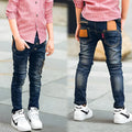 Boys stretch denim pants in denim blue with zipper pocket, soft cotton fabric