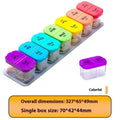 Extra large white and rainbow coloured plastic pill organiser box with 14 removable compartments.
