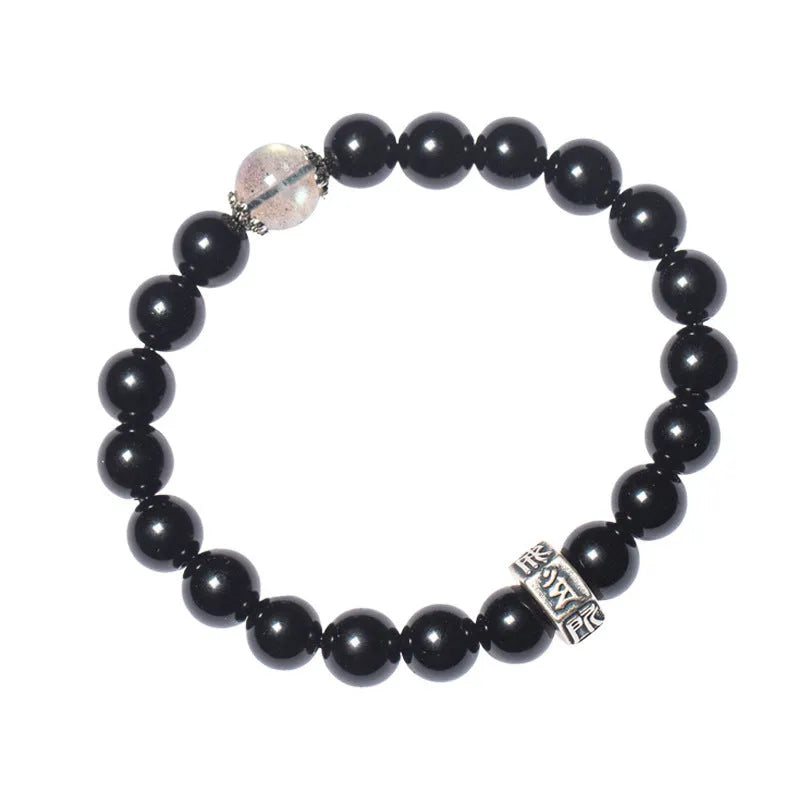 Black obsidian bracelet with 8mm beads carved with Zodiac animal and Buddhist bodhisattva designs.