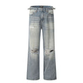 Blue straight-leg jeans with ripped detailing on cotton blend fabric