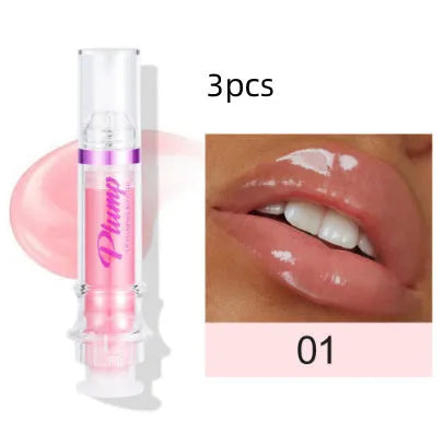 Lip gloss tube with mirror finish showing shiny application on lips
