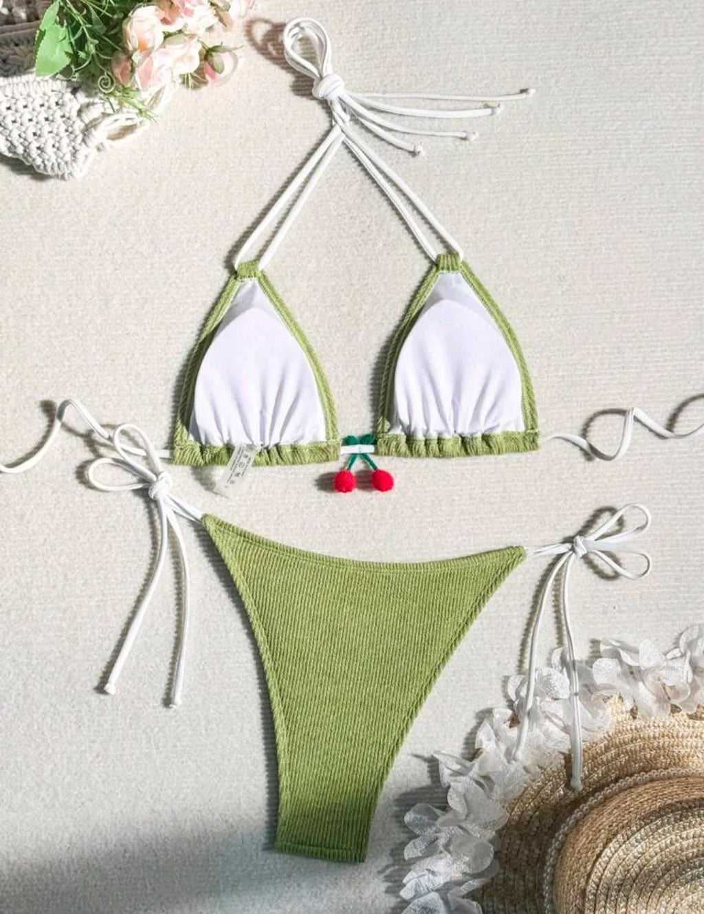 Women's bikini swimsuit set in a briefs style, shown in one of five solid colours: apricot, matcha, orange, pink, or white.