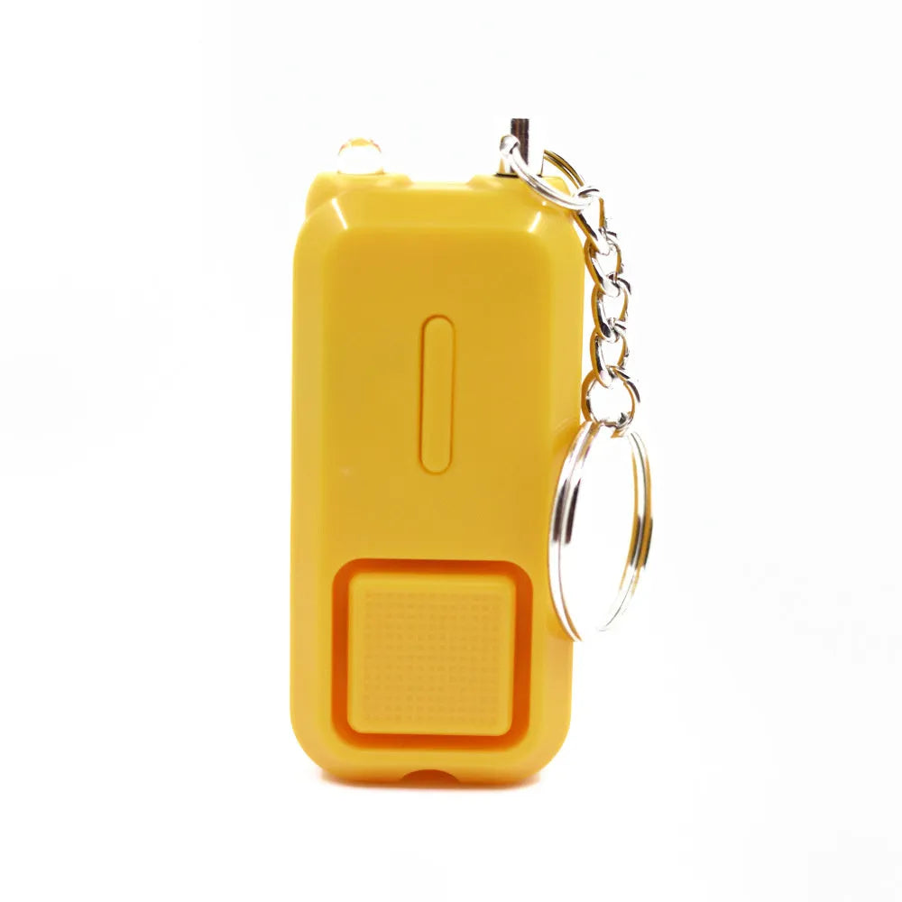 Compact pink personal safety alarm measuring 65mm long with emergency siren function