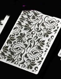 Plastic folding cake decorating mould showing windmill and five-pointed star design options