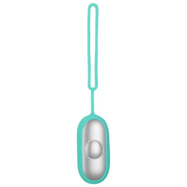 Handheld microcurrent sleep aid device with round control button in grey, green, or orange colours