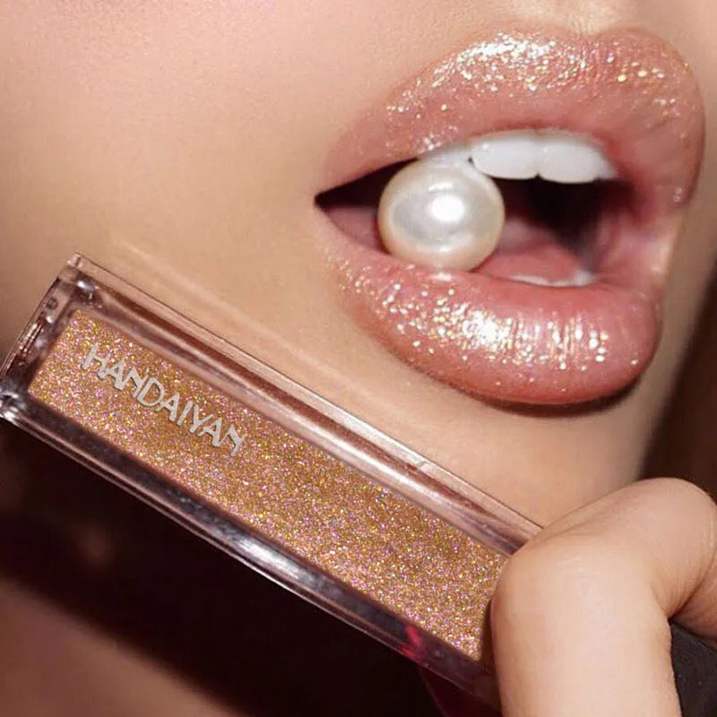 Pearlescent colourful lip gloss tube with shiny waterproof formula in five shades
